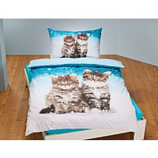 Parure de lit avec délicieux chatons sur un fond blue-blanc