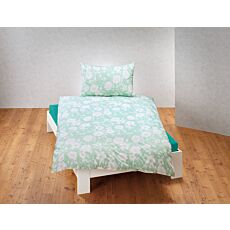 Parure de lit avec motif floral blanc sur fond coloré