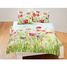 Linge de lit agrémenté d'une prairie fleurie colorée et de papillons