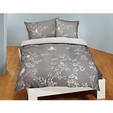 Parure de lit avec un fin imprimé floral et un motif d'oiseau