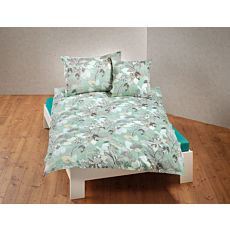Parure de lit avec motif naturel sur fond vert clair