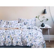 Parure de lit avec motif de fleurs bleues sur fond clair