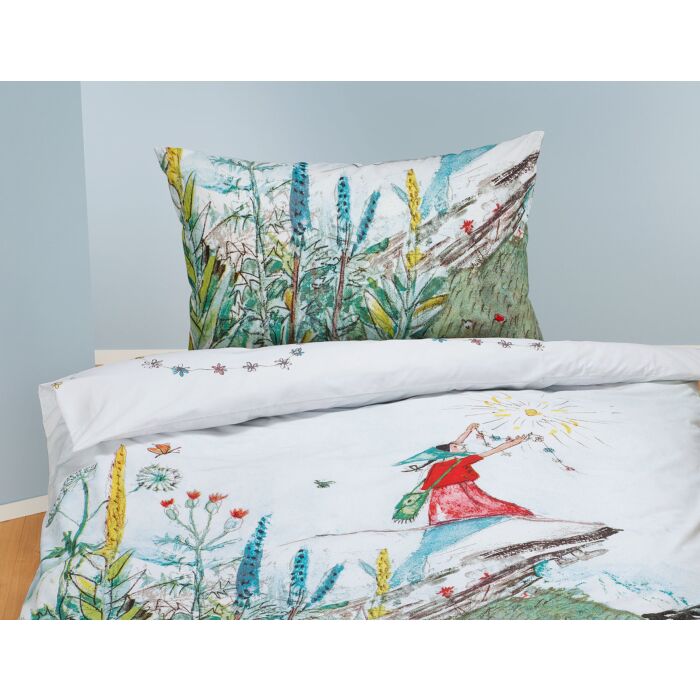Parure de lit avec Flurina sur fond de prairie printanière