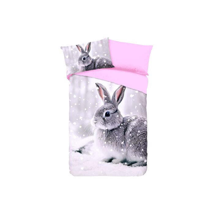 Parure de lit avec un mignon petit lapin dans la neige main product photo