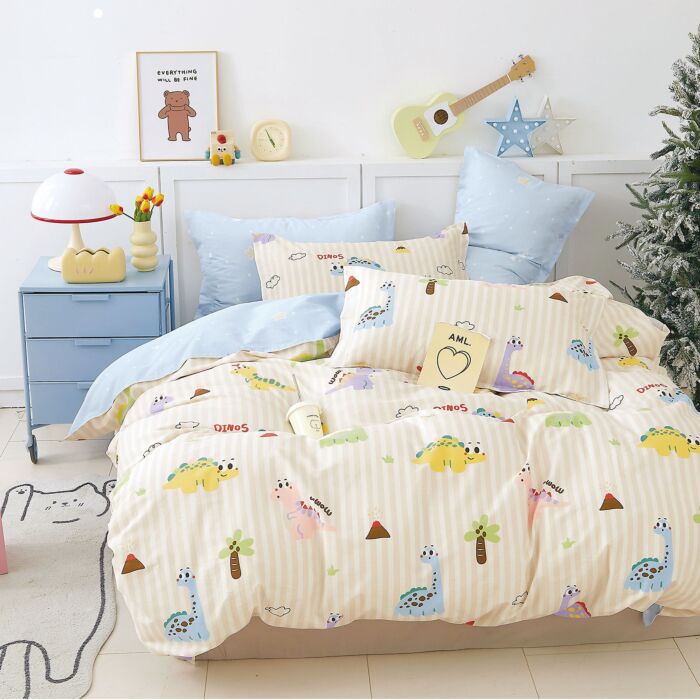 Linge de lit avec des dinosaures joyeux