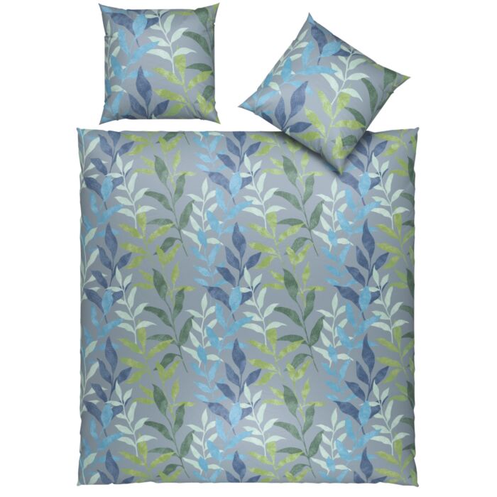 Linge de lit ornée de jolies feuilles