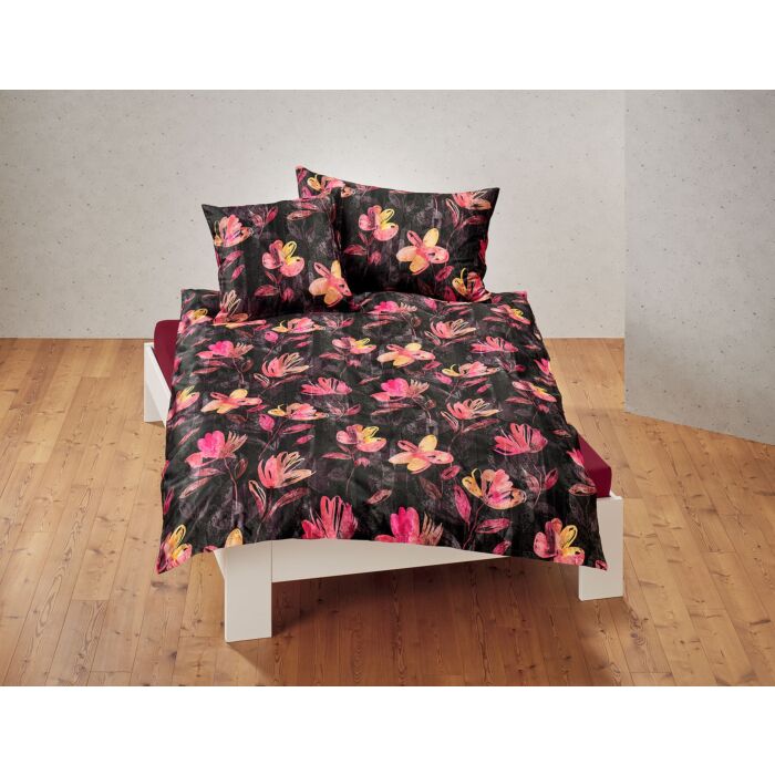 Parure de lit orné des superbes fleurs colorées sur fond foncé main product photo